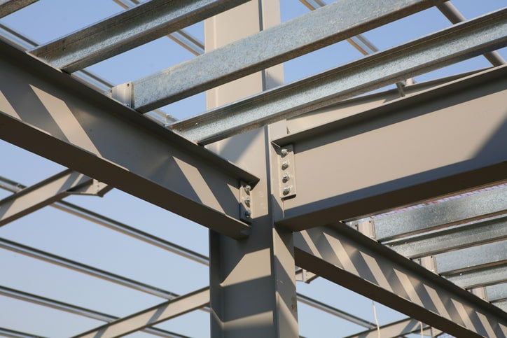 Structural steel frame with bolted beams showing construction grades in Philadelphia, PA